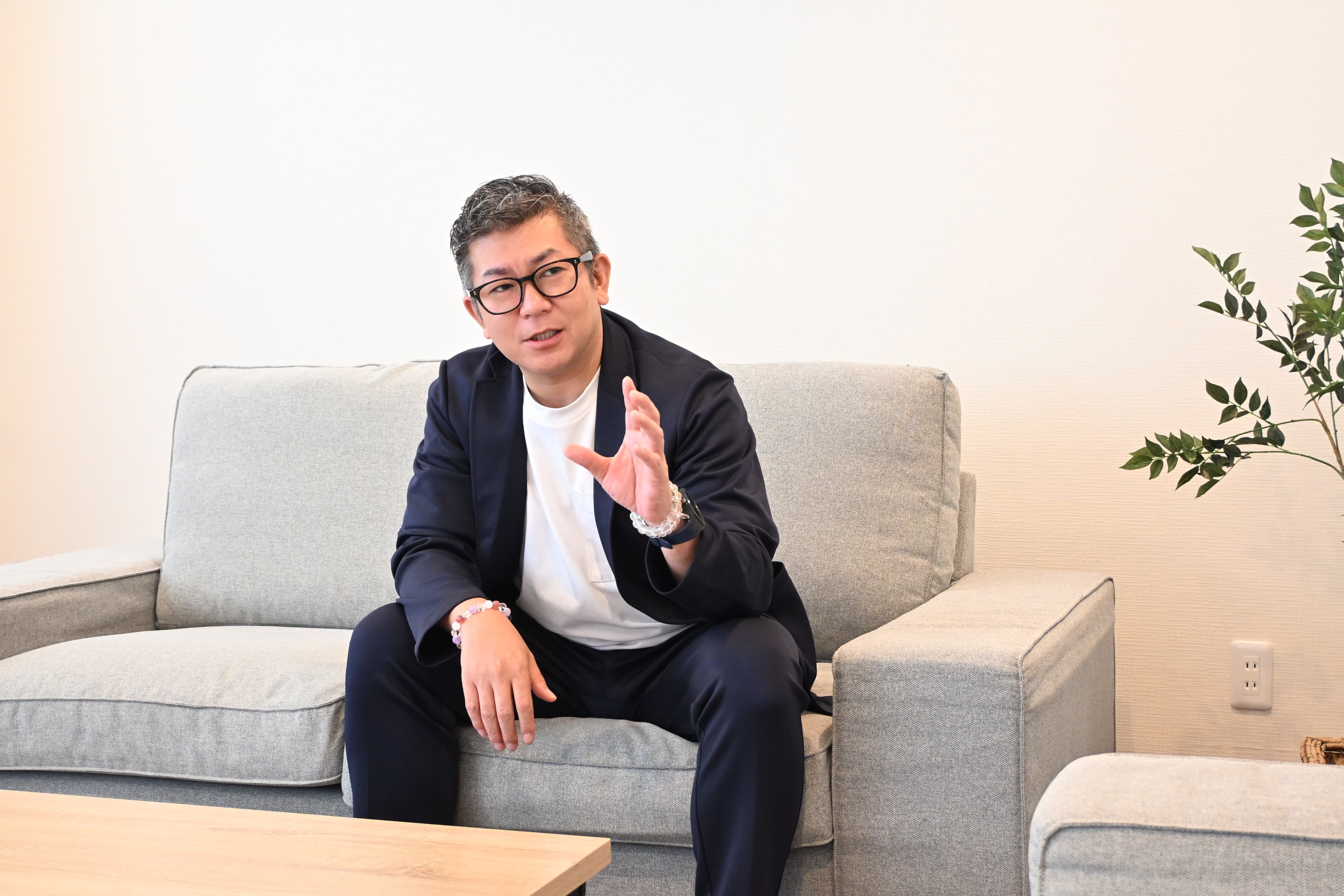 話す関野代表